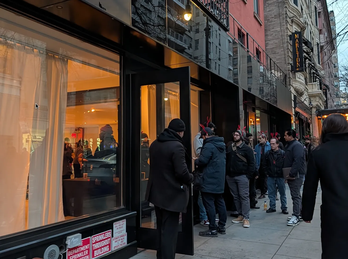 Line outside ClawCon NYC with lobster hats
